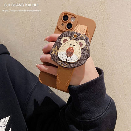 潮牌卡通立体狮子头腕带适用苹果15promax手机壳iphone16plus/13/14promax防摔壳11/12mini女款xs/xr/7/8plus