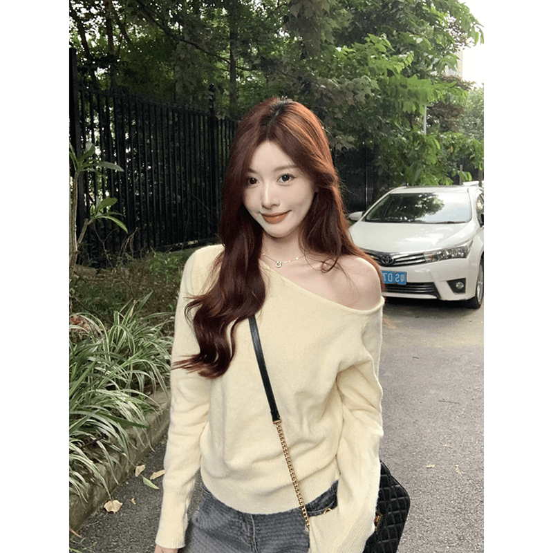黄色不规则斜肩毛衣女2025初春季新款修身露肩针织衫早春chic上衣