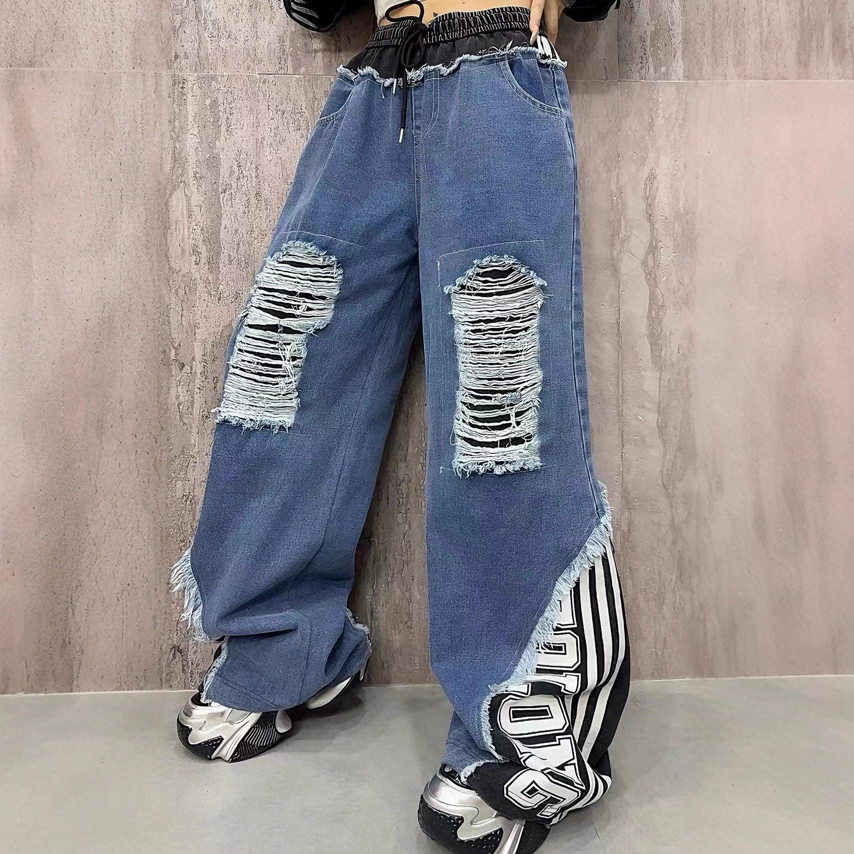欧货潮牌宽松破洞牛仔裤女2026春款个性拼接假两件字母印花直筒裤