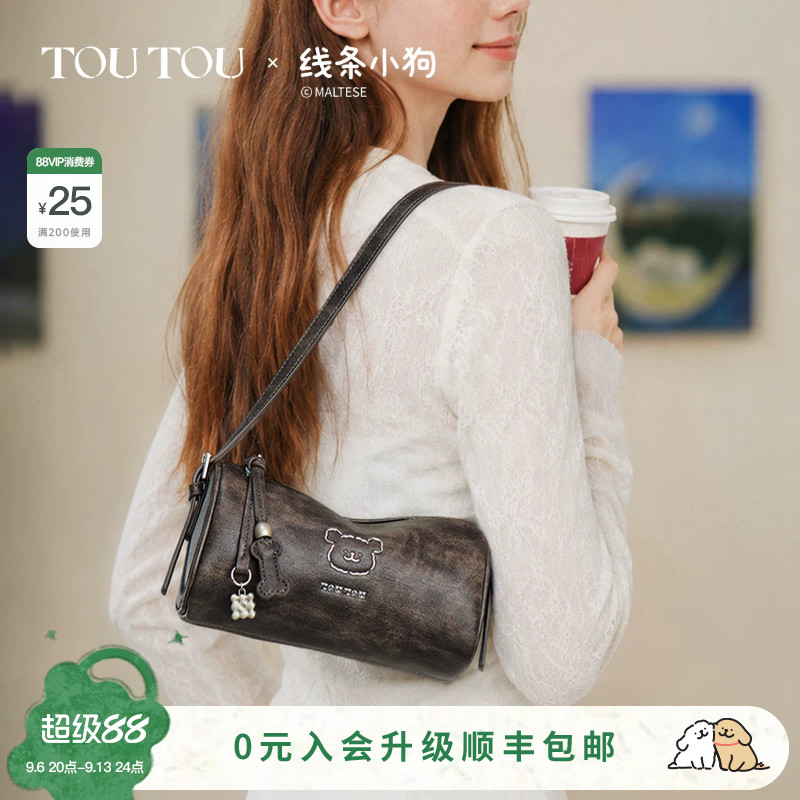 TOUTOU线条小狗圆筒包软皮腋下包图片