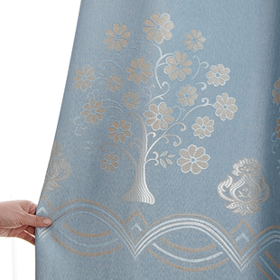 轻奢北欧窗帘蓝色提花2024新款卧室客厅遮光隔热简约纯色高级感