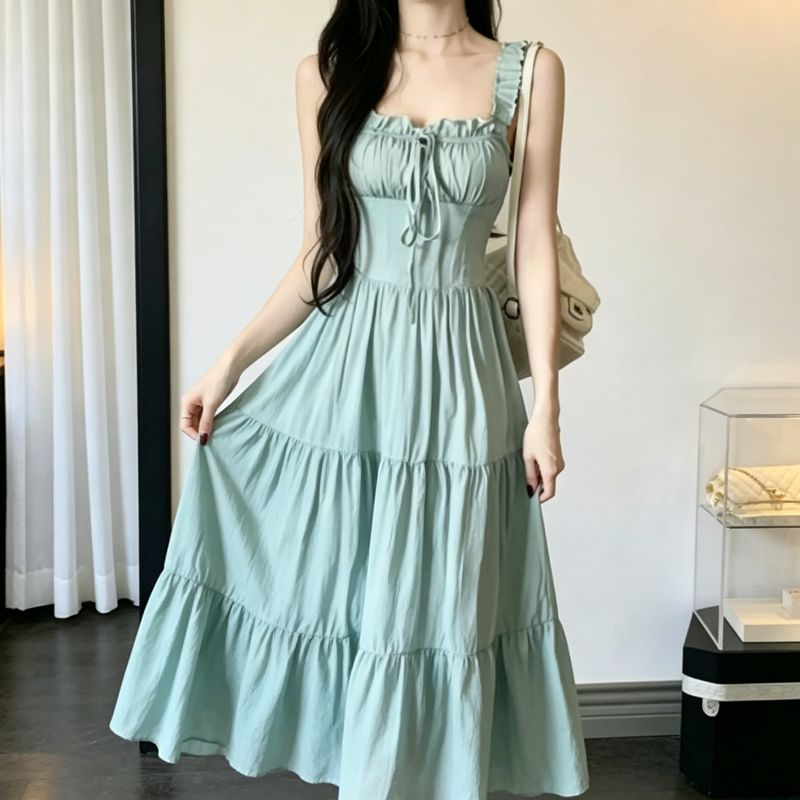 法式茶歇蓝色吊带连衣裙子女夏季2026新款温柔初夏装气质修身长裙