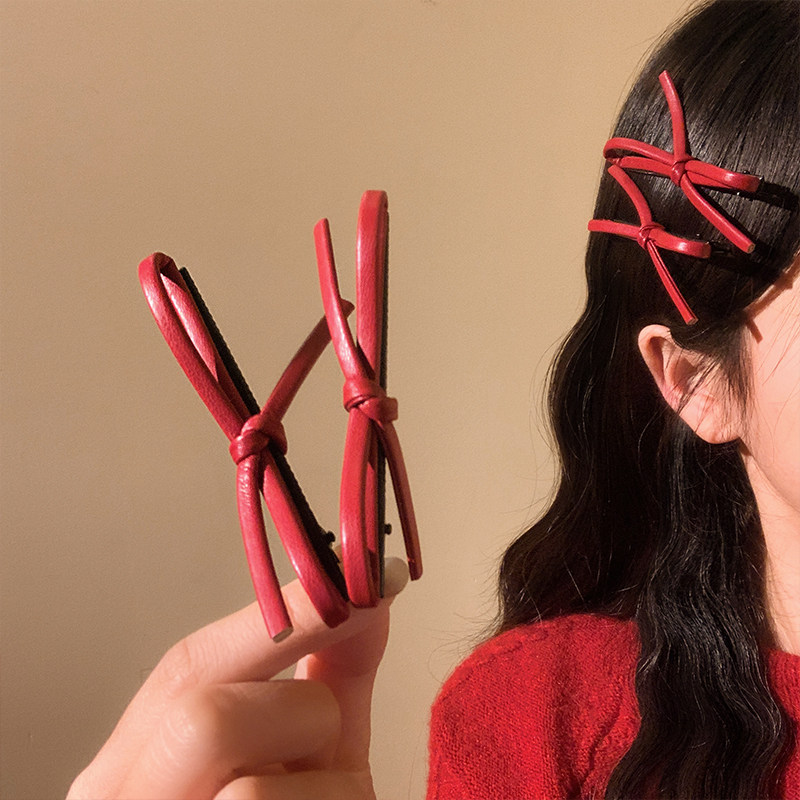 复古酒红色皮质蝴蝶结发夹