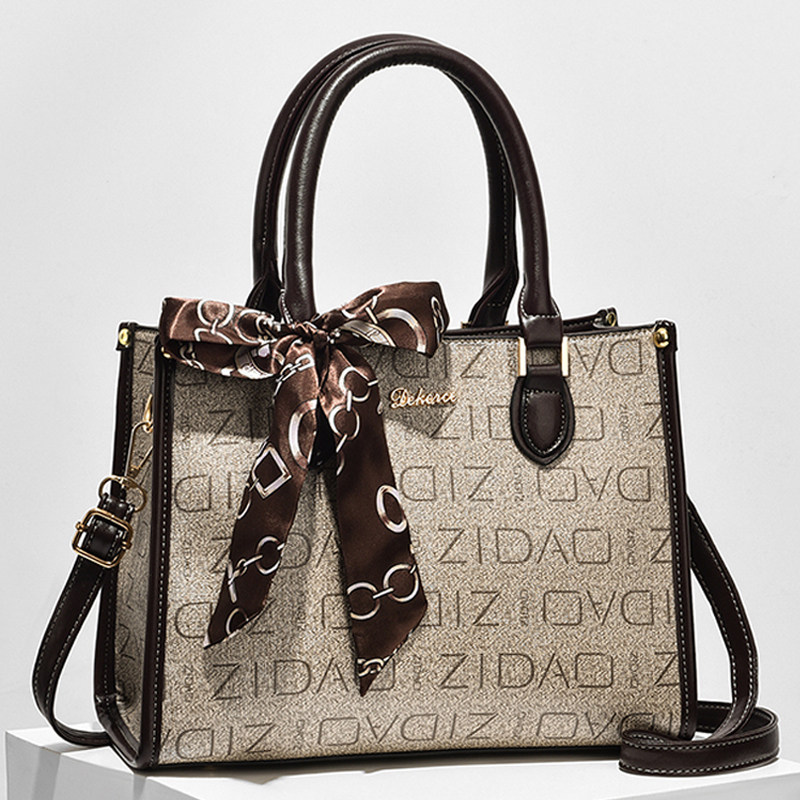 通勤包包女2026新款高级感中年女包妈妈手提包春夏小众轻奢斜挎包