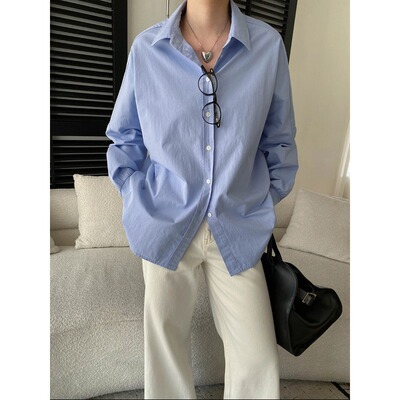 司南早春新款气质法式宽松慵懒风侧开叉设计感通勤衬衫SN8525