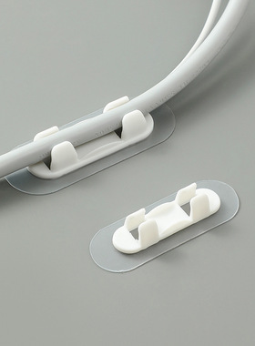 Wire storage and management device, data cable holder, cabl