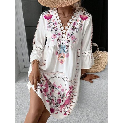 A womens printed Vneck lace spliced bellsleeve highwaisted