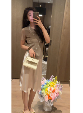 2N.COU妮蔻26春新款光泽垂感醋酸显瘦半身裙女气质高腰A字短裙