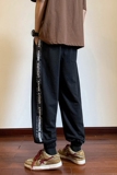 B335-A472-P55控685050聚酯纤维束脚侧边印花宽松休闲卫裤2，男装休闲裤，电商B335