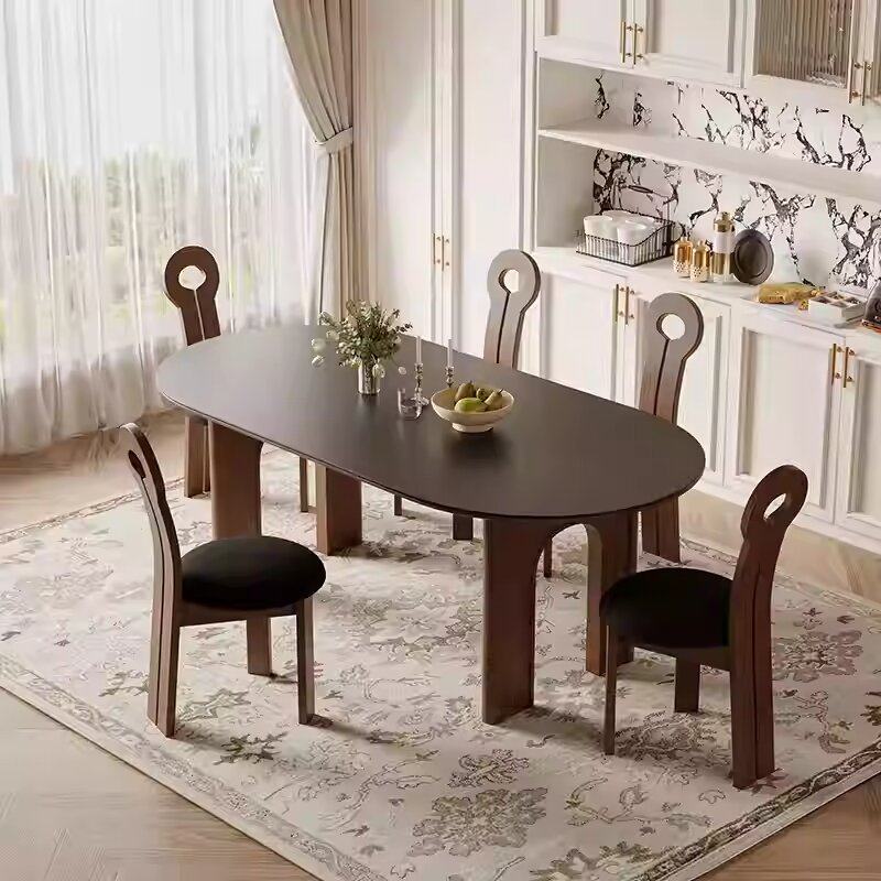 北欧设计师款椭圆形实木餐桌法式复古岩板餐椅组合小户型家用饭桌