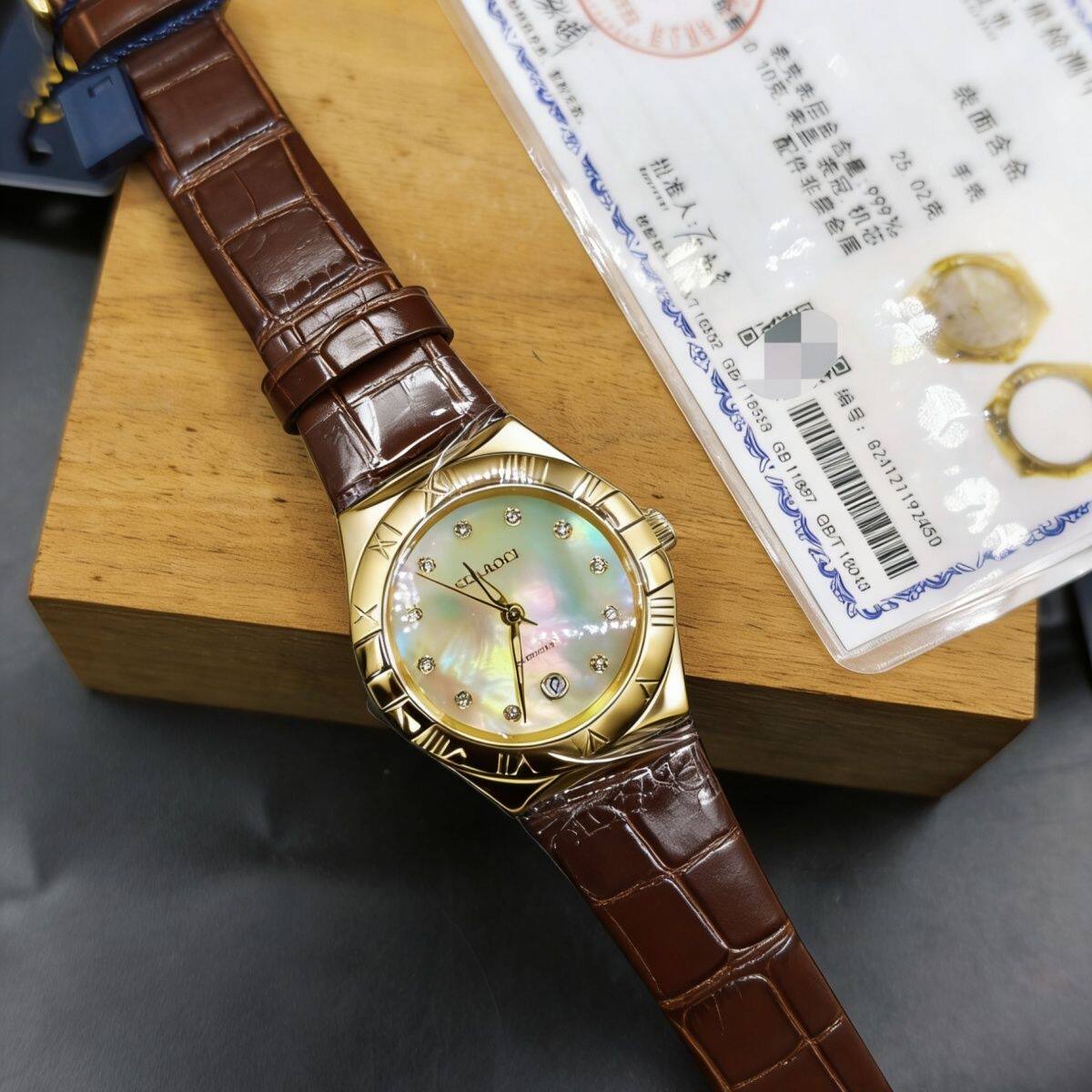 全新克劳伦999纯金星座女士28mm黄金贝母真皮石英表(表壳含金0.1)