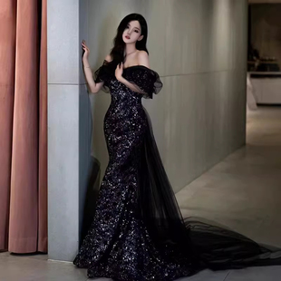 一字肩鱼尾晚礼服2026新款轻奢小众宴会气质年会主持人演出服黑色