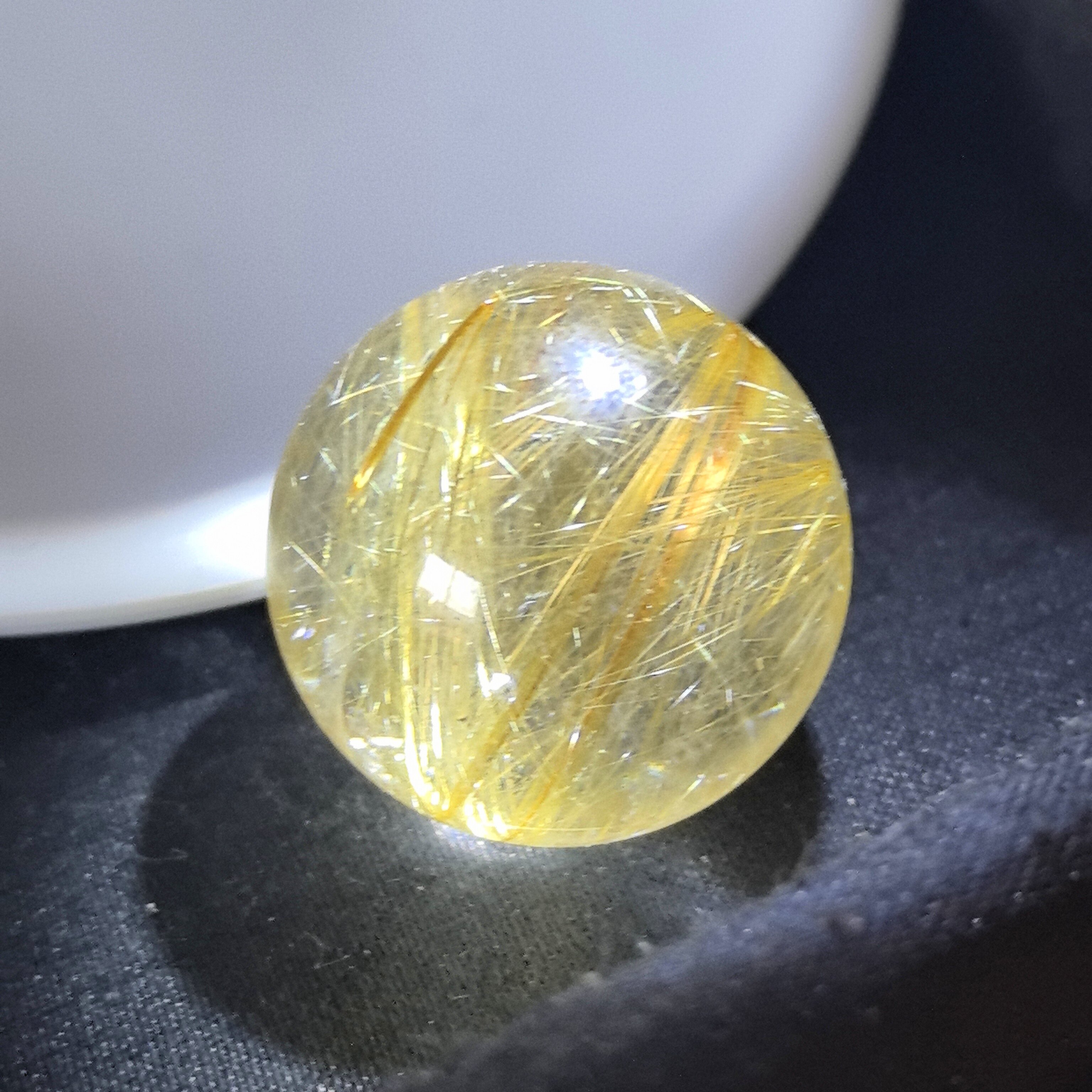 24㎜(没有任何优化注胶)老矿巴西天然金钛晶金发晶花单珠水晶