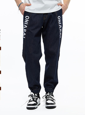 ONIARAI/鬼洗秋季飞鹰分割线条男士刺绣束脚牛仔长裤 23B7411