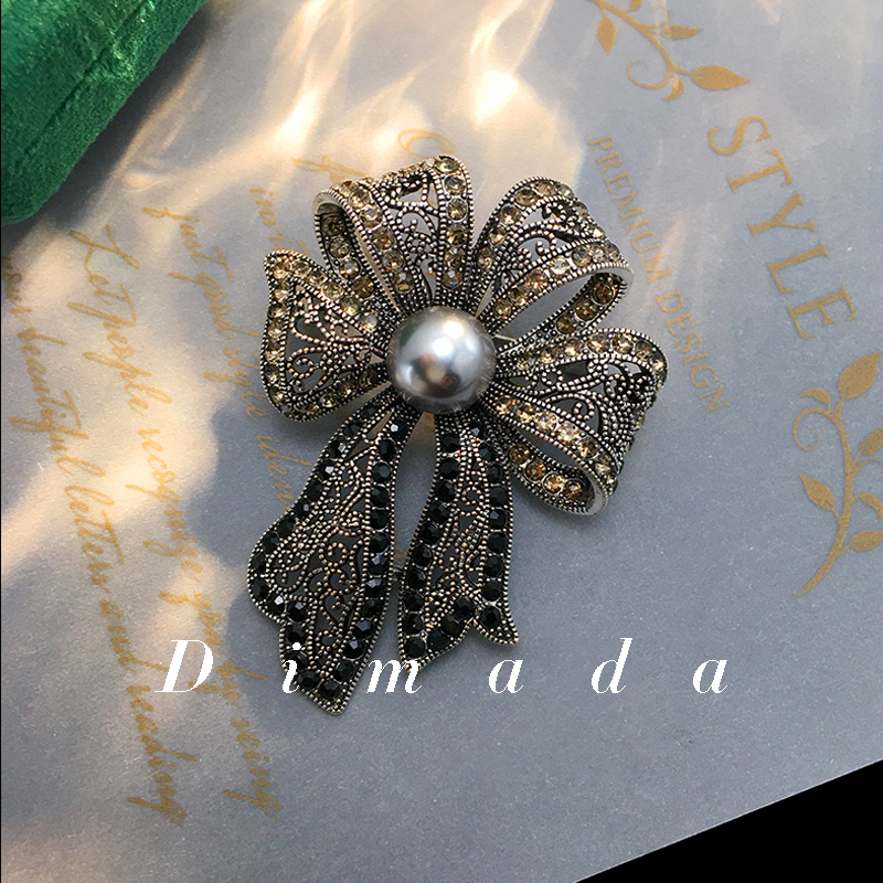 日韩镀金镂空黑色蝴蝶结胸针女
