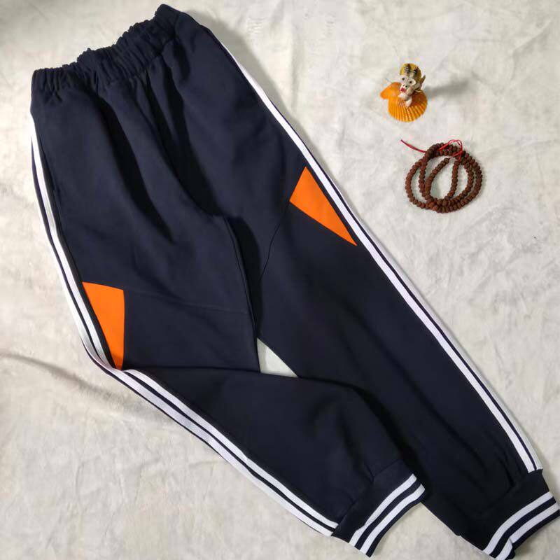 藏蓝色校服裤子两道白杠中间拼接三角橘色桔色裤脚收口束脚二白杠