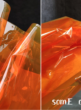 新版液体膜橘黄色tpu设计师面料 薄膜透视服装风雨衣设计师布料