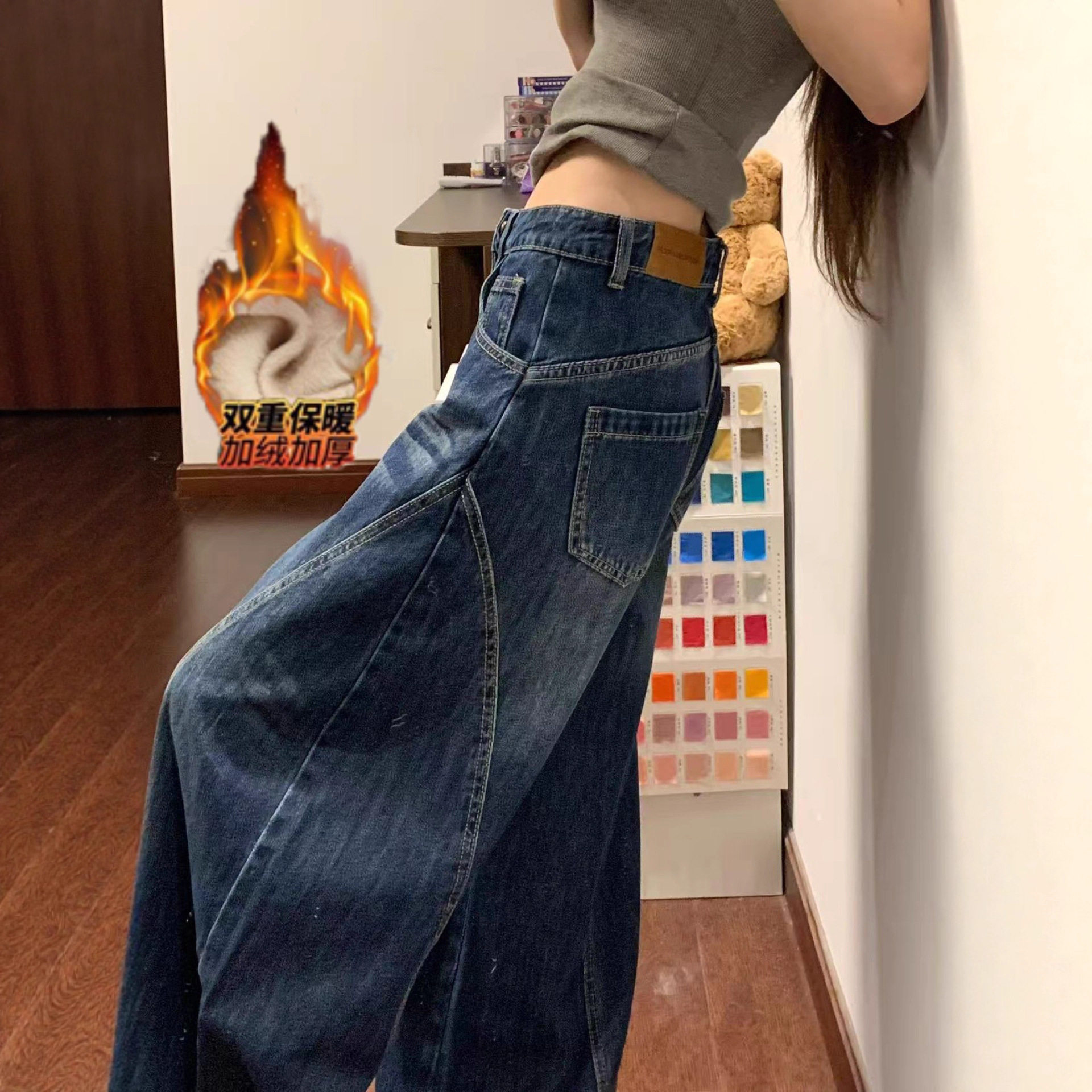 深蓝色弯刀牛仔裤女2026年春秋新款时髦设计感加绒宽松垂感阔腿裤