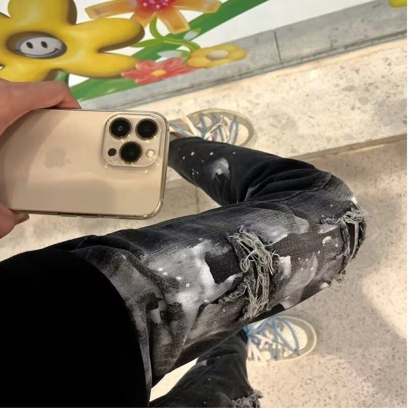 欧美潮牌秋季新款男士黑灰色泼墨涂鸦破洞牛仔裤男弹力修身小脚裤图片