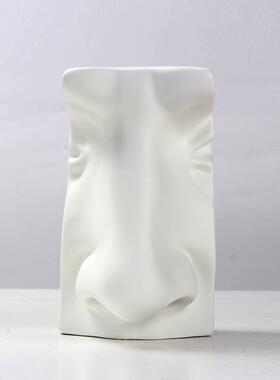 简约现代抽象人脸五官艺术雕塑摆件玄关酒柜意式极简样板间装饰品