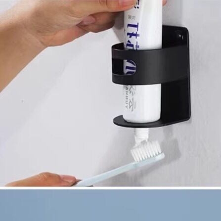 不锈钢牙膏支架卫生间壁挂式免打孔放牙膏上墙浴室剃须刀黑色架子