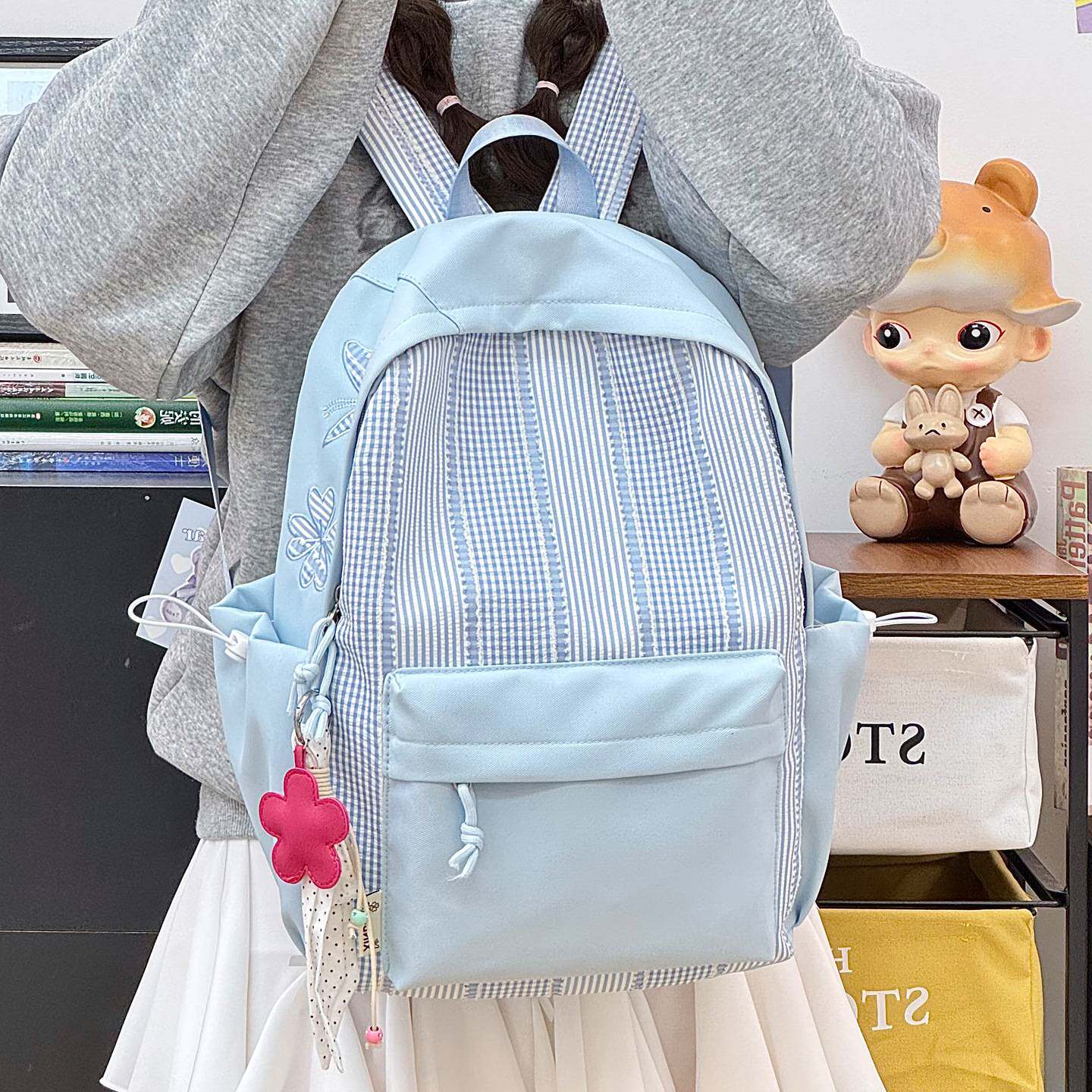 商场品牌韩版新款高颜值校园轻便背包可爱小学生初中生书包女生出