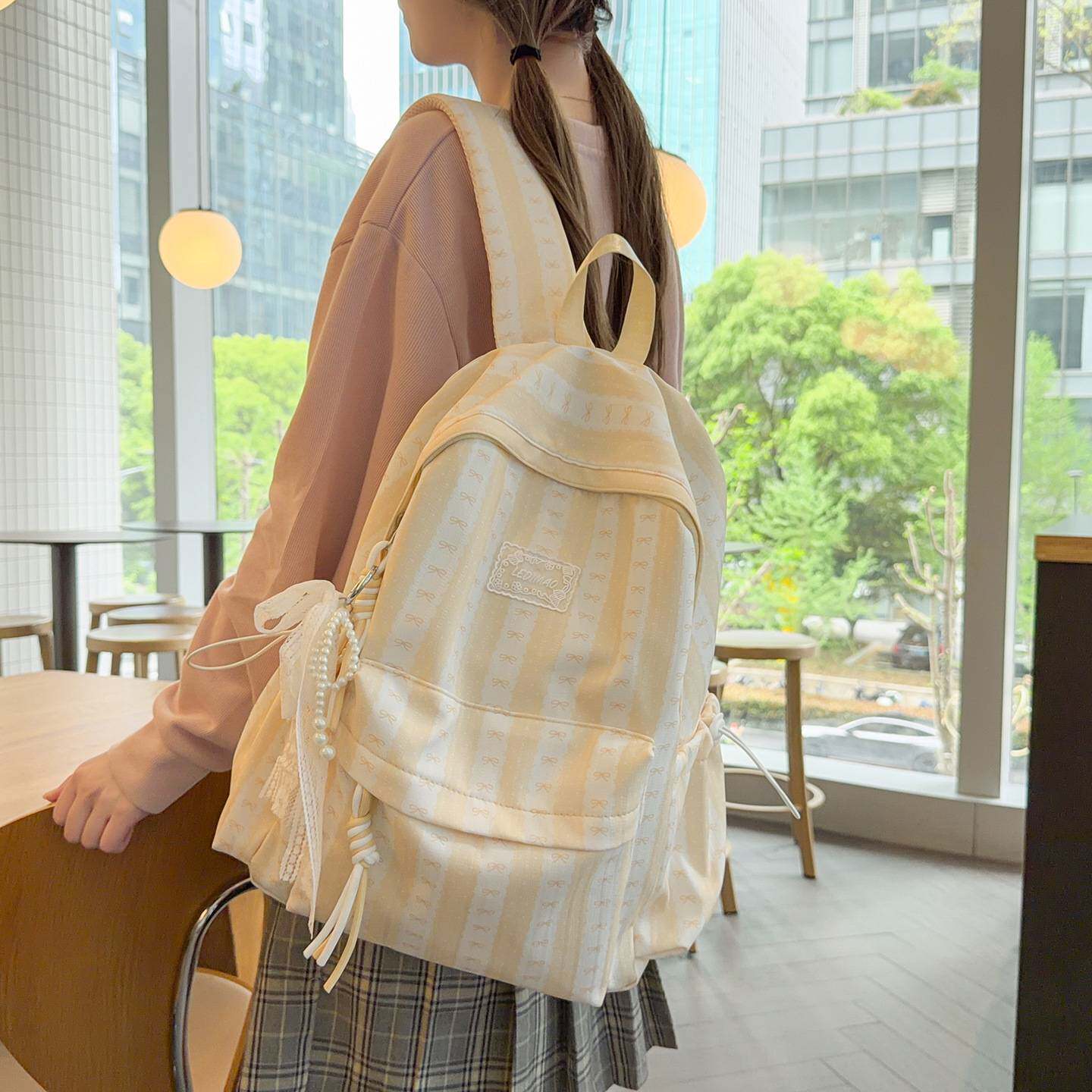 商场品牌ins书包初中生女高中大学生高颜值小众新款通勤背包大容