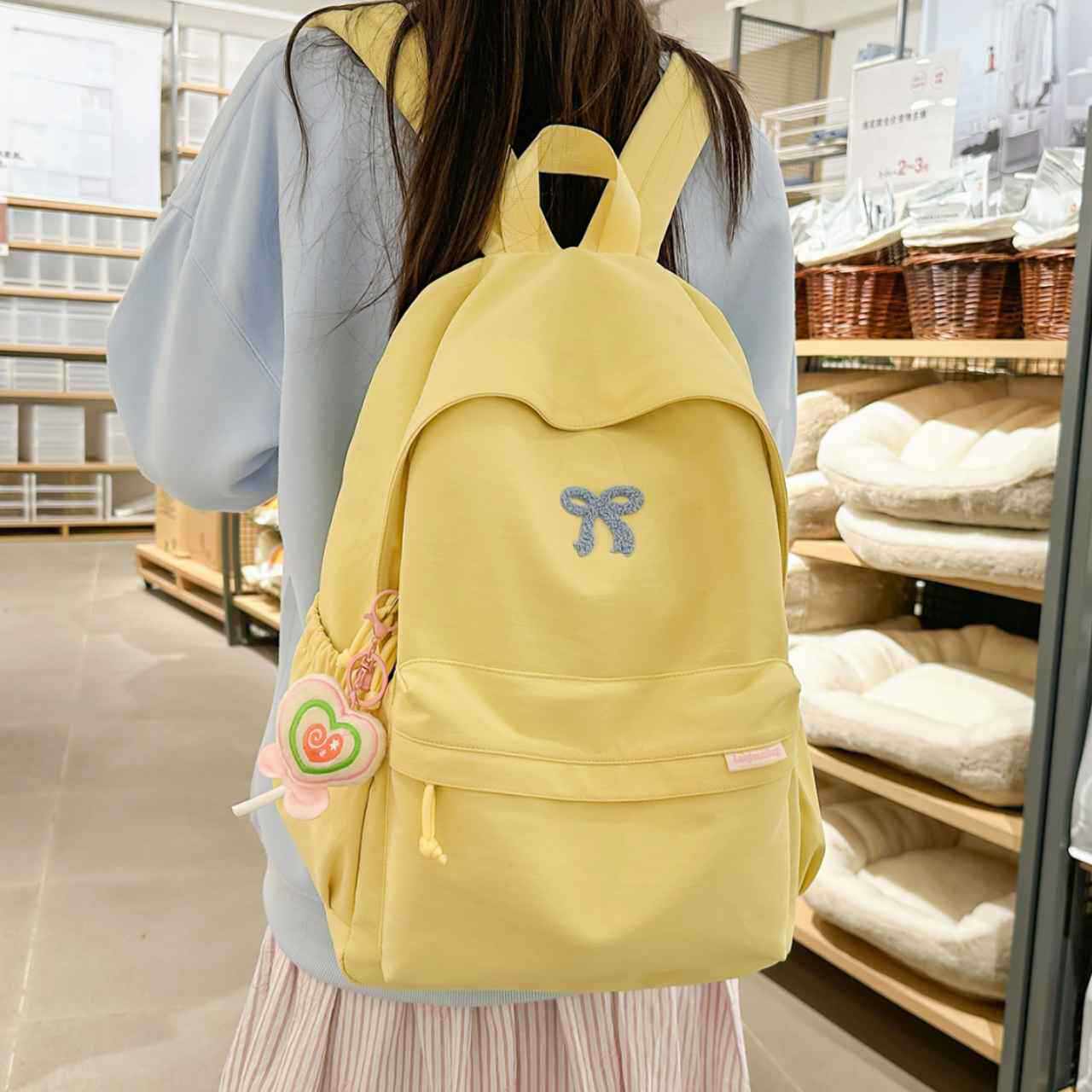 商场品牌慵懒风书包女初中生高颜值小众2026新款百搭学生简约双肩