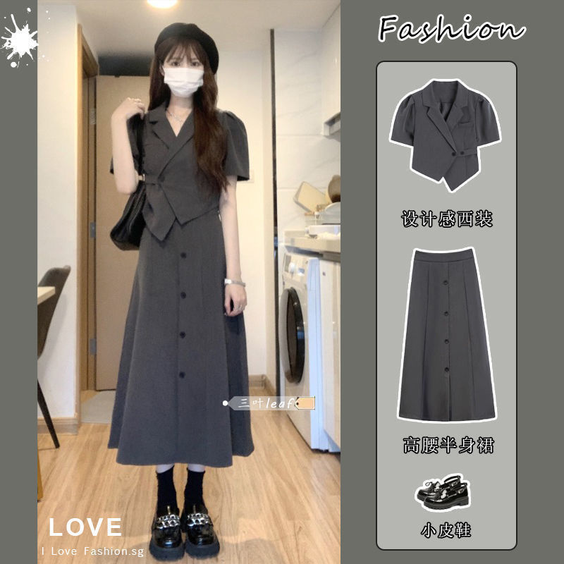 套装女2022夏季新款港风短款不规则翻领西装上衣高腰半身裙两件套