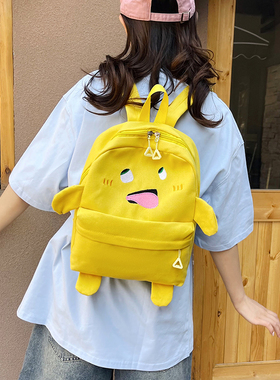 原创日系背包可爱帆布款黄色奶龙百搭学生软妹双肩包卡通书包