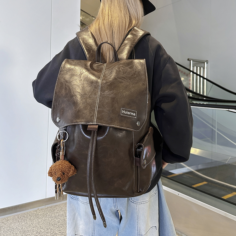 复古大容量双肩包女2025新款旅行通勤电脑背包休闲大学生书包男生