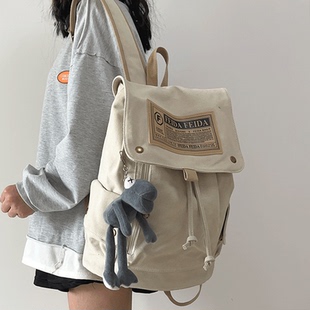 帆布双肩包男生2025新款大容量旅行背包初中高中大学生简约书包女