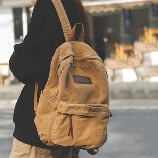 简约港风复古水洗帆布书包男大学生高中生背包女大容量旅行双肩包