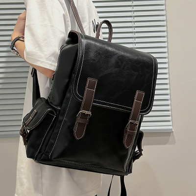 高级感复古双肩包女2025新款大容量皮质通勤电脑背包大学生书包男