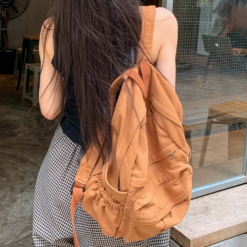 菇八八书包女复古森系帆布双肩包