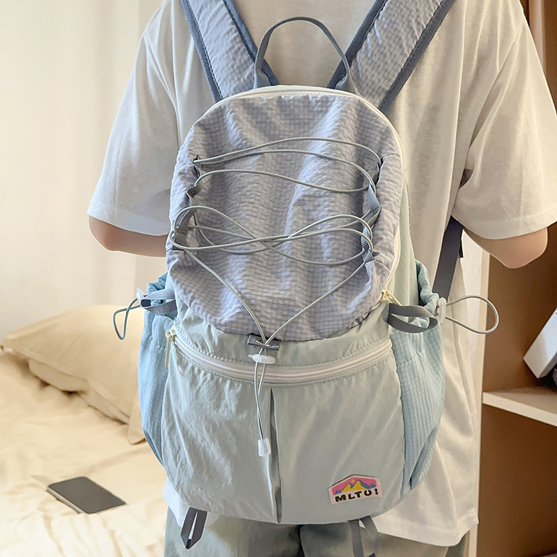 轻便简约户外登山背包女2025新款时尚百搭双肩包轻便旅行学生书包