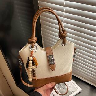 专柜品牌高级感菜篮子小众包包女士复古撞色水桶包时尚百搭单肩斜