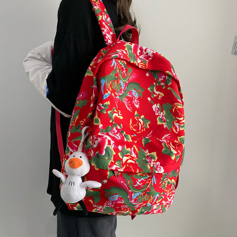 2024东北大花布双肩包网红潮男背包学生上课书包短途包女双肩背包