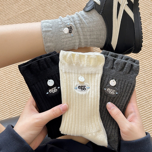 黑白袜子女中筒袜纯棉春秋百搭韩国东大门潮流egg布标卷边堆堆袜