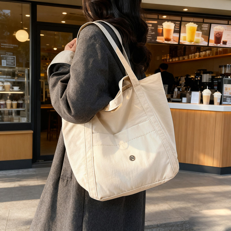 帆布包大包包女2025新款潮百搭轻便通勤单肩包托特包,箱包皮具/热销女包/男包,单肩包,淘宝优惠券,粉丝福利购,淘宝优惠卷