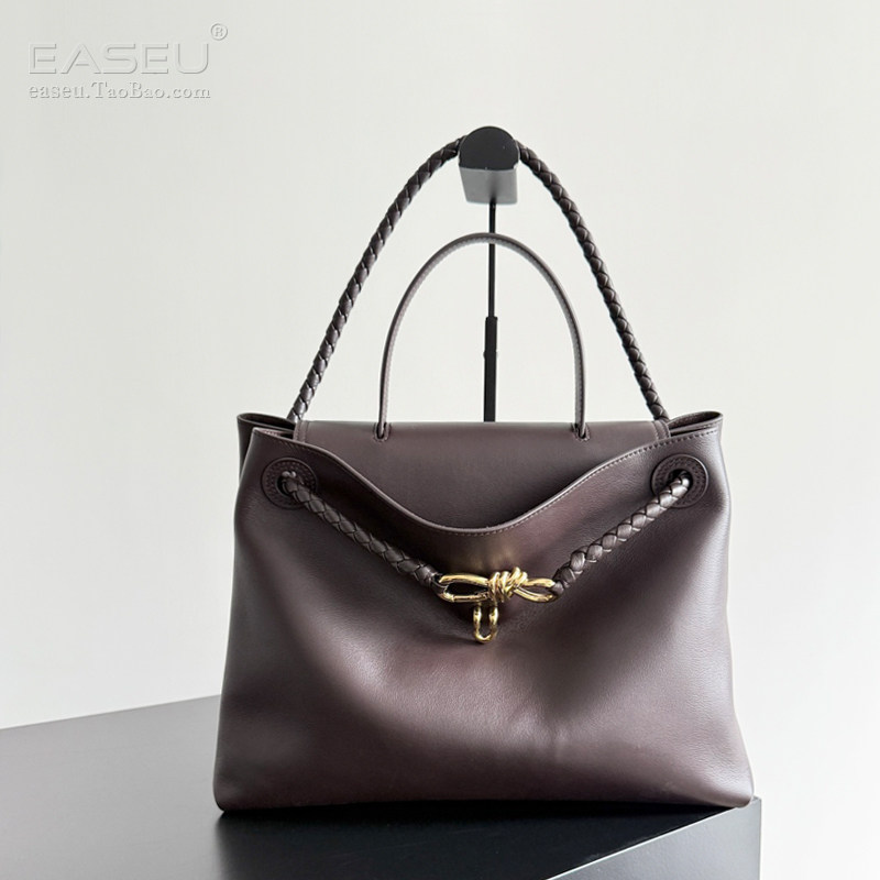 真皮男女情侣款托特包包通勤编织