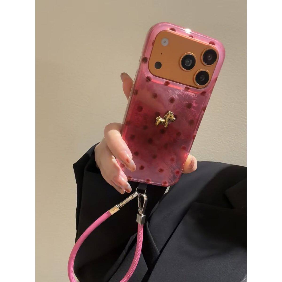 玫红波点立体金马手机壳