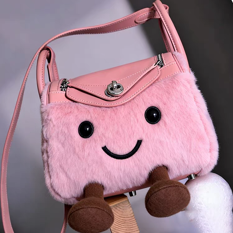 毛茸茸小精灵枕头包卡通玩偶包