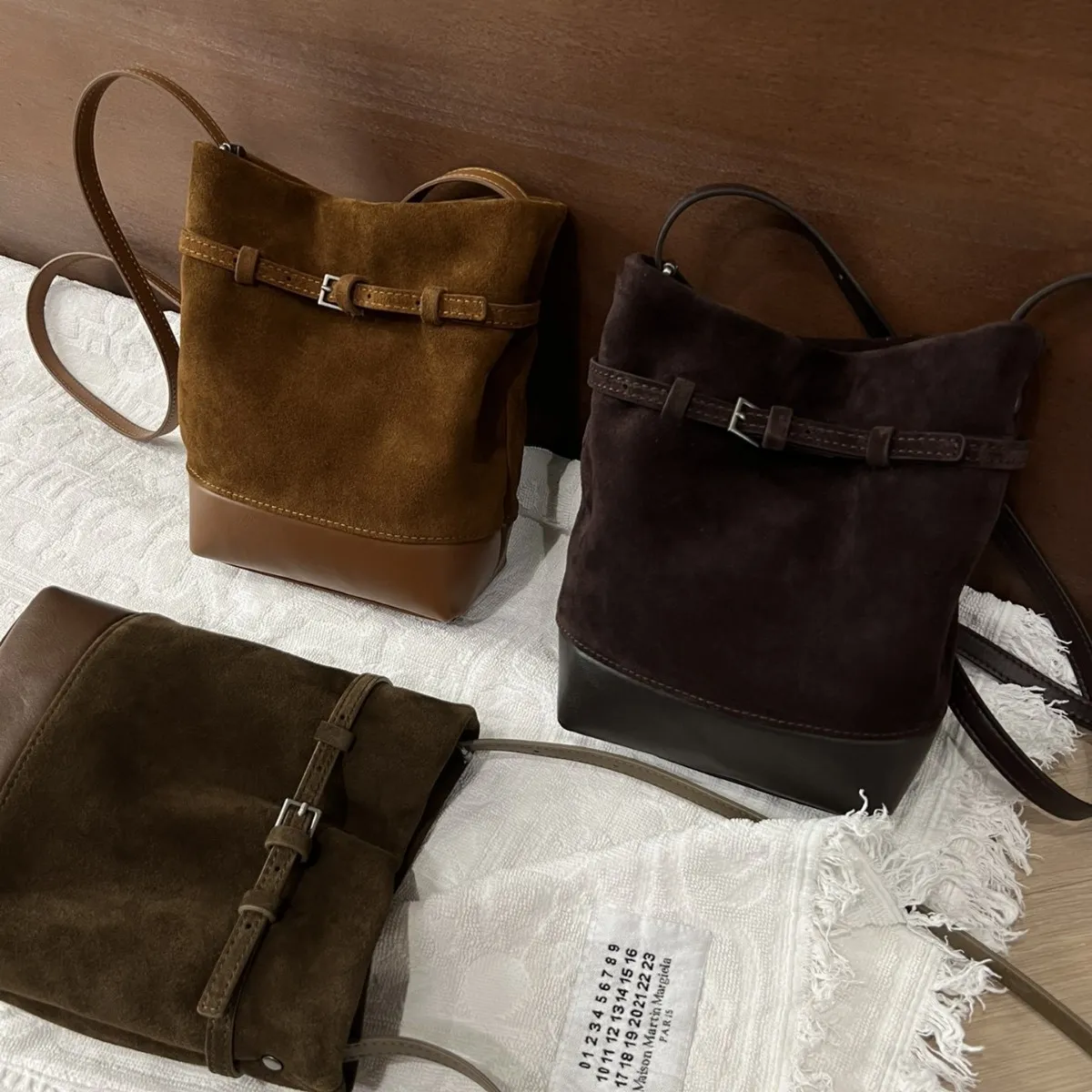 小众磨砂牛皮福袋水桶包单肩斜挎女包时尚百搭潮皮带扣设计质感包