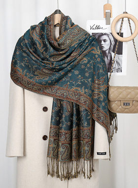 Women with long scarves printed with cashew nuts are vogue