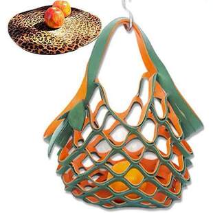 The Zest Bag Leather Folding Tote Bag is a vibrant leather