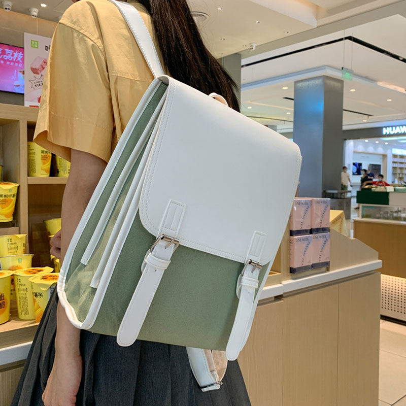 书包女三到六年级防水免洗双肩包