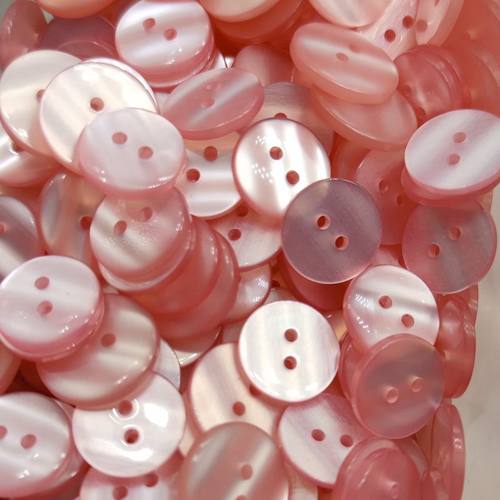 两眼珠光羊毛衫毛衣浅粉色纽扣子