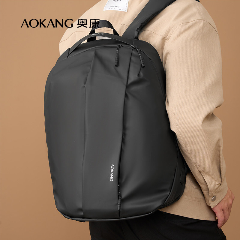 奥康男包防泼水黑色竖款双肩包背包大容量商务出差电脑包旅行书包