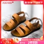 Giày nam Aokang 2019 hè mới thời trang dập nổi gót Velcro thoáng khí Giày đi biển Roman sandal nam - Sandal giày lacoste nam